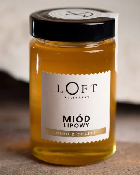 Miód lipowy w słoiku – klasyczny miód do herbaty na loftowym tle