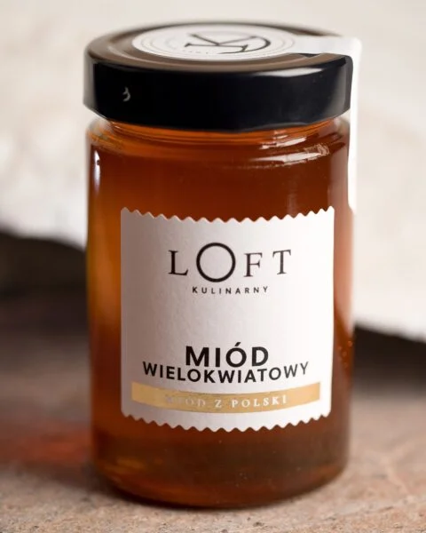 Miód wielokwiatowy w słoiku – naturalny miód do kuchni na loftowym tle